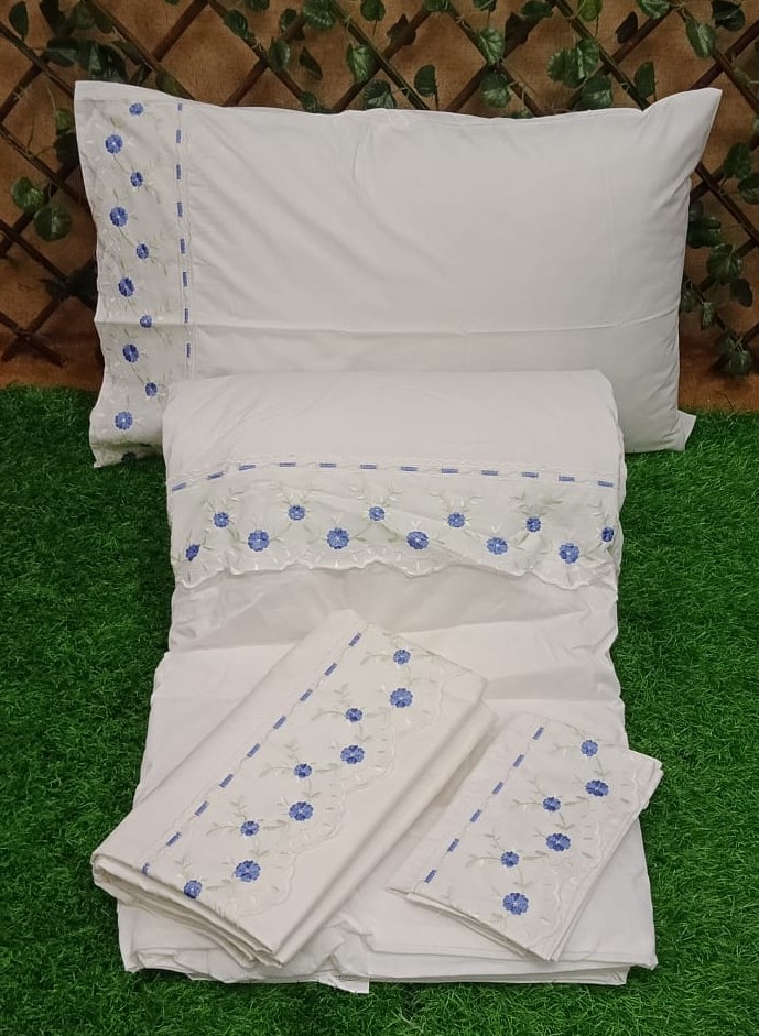 Beautiful White Base Frilled Comforter Set by Metropolis